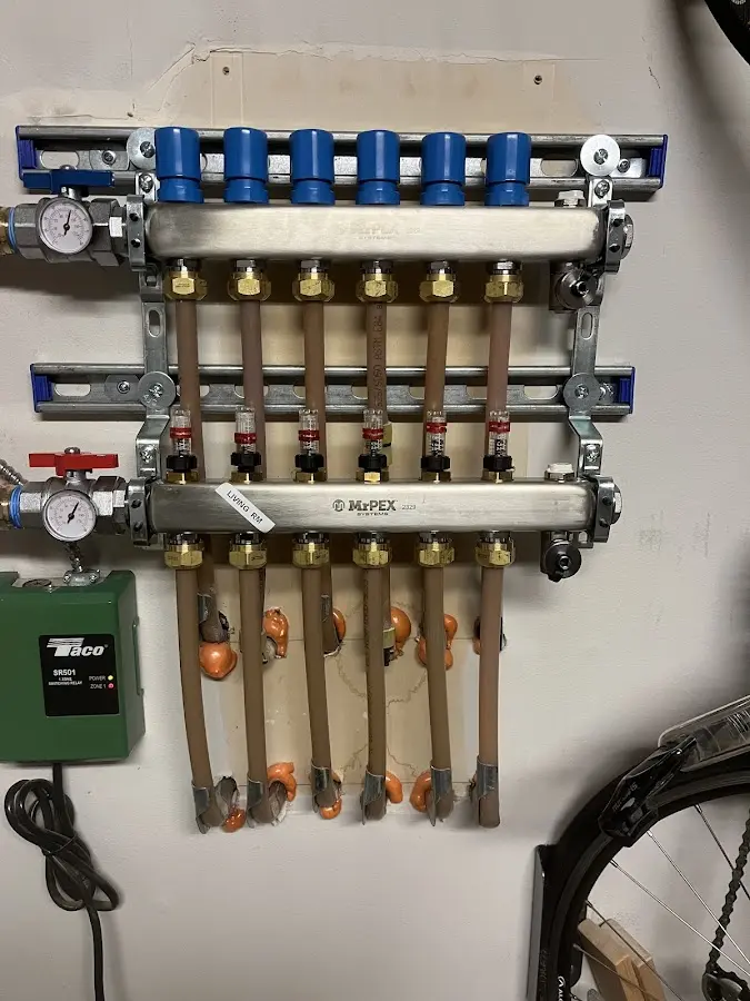 Plumber performing Water Heater Repair at a residential property in Richmond Heights